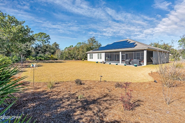 view of yard with a sunroom