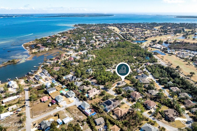 aerial view featuring a residential view and a water view