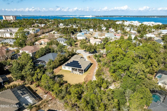 aerial view with a water view and a residential view