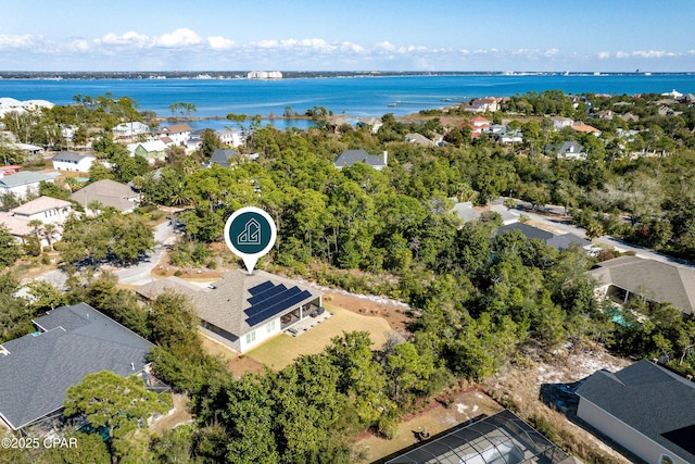 aerial view featuring a water view and a residential view