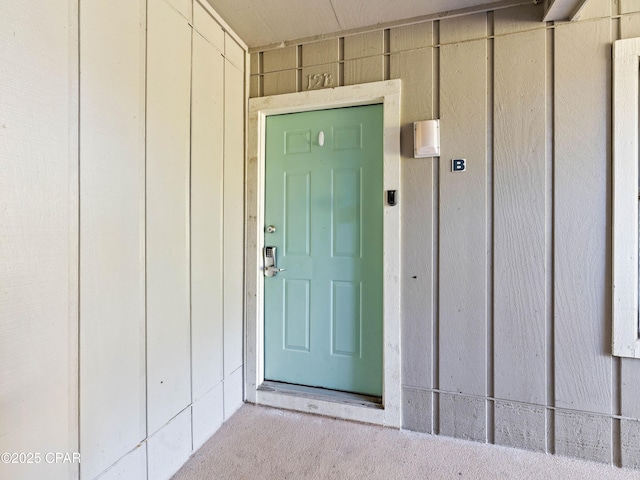 3799 E County Highway 30a Unit B12, Santa Rosa Beach, FL 32459 - doorway to property featuring board and batten siding
