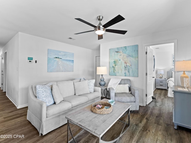 3799 E County Highway 30a Unit B12, Santa Rosa Beach, FL 32459 - living area with ceiling fan and dark wood-style flooring