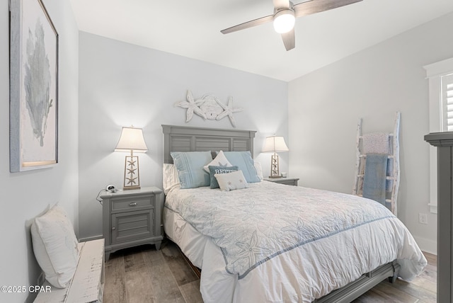 bedroom with wood-type flooring and ceiling fan