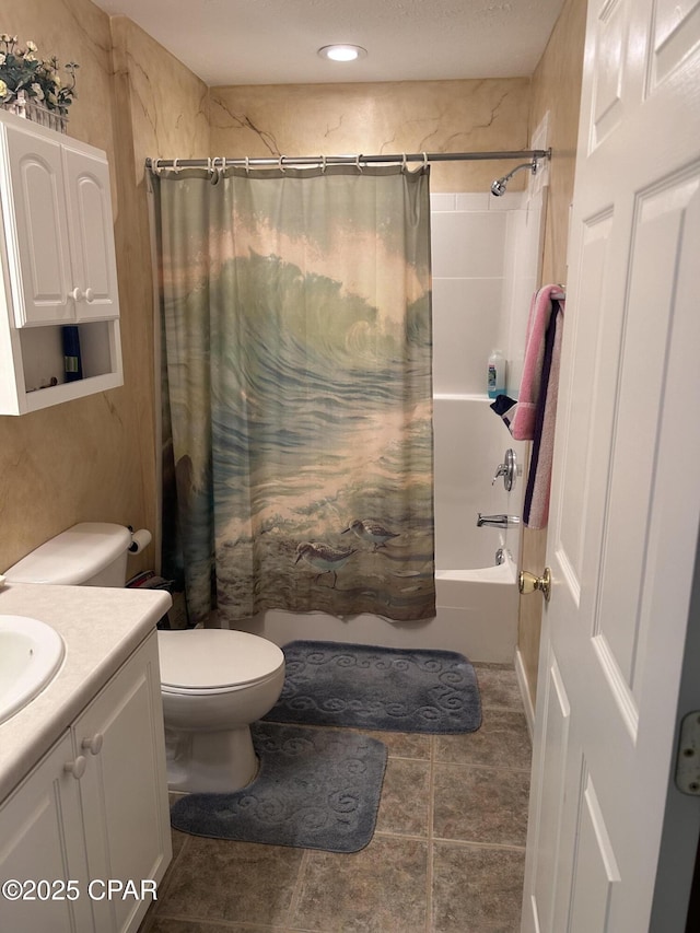 bathroom with toilet, shower / tub combo, vanity, and tile patterned flooring