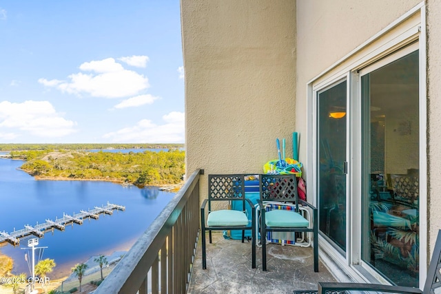 balcony featuring a water view