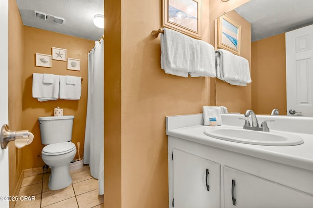 full bathroom featuring toilet, tile patterned flooring, visible vents, and vanity