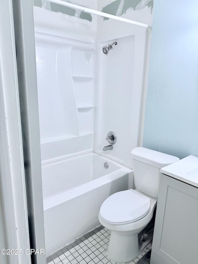 full bathroom with tile patterned floors,  shower combination, toilet, and vanity