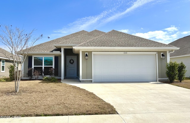 single story home featuring a garage, concrete driveway, and roof with shingles