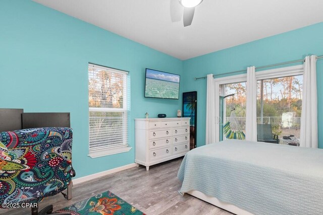 132 Gulf Terrace Ln, Port St Joe, FL 32456 - bedroom featuring wood finished floors, baseboards, and a ceiling fan