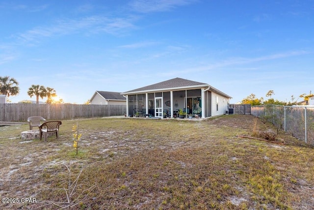 132 Gulf Terrace Ln, Port St Joe, FL 32456 - rear view of property with a sunroom