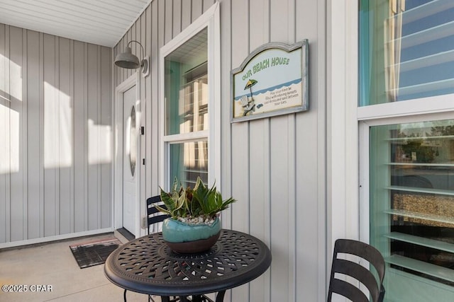 132 Gulf Terrace Ln, Port St Joe, FL 32456 - doorway to property with board and batten siding