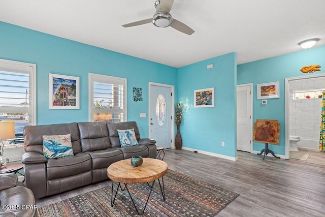 132 Gulf Terrace Ln, Port St Joe, FL 32456 - living room featuring wood finished floors, a ceiling fan, and baseboards