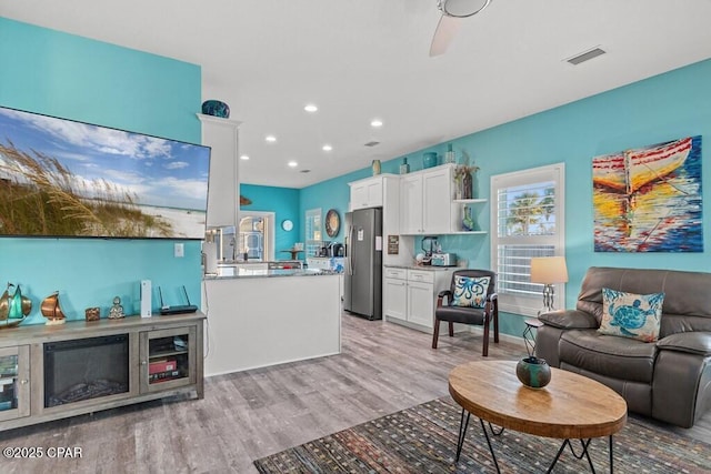 132 Gulf Terrace Ln, Port St Joe, FL 32456 - living area featuring light wood-type flooring, recessed lighting, and a ceiling fan