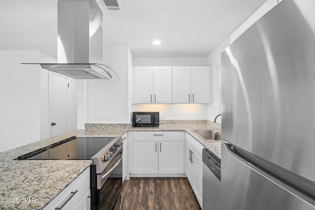 kitchen with sink, island exhaust hood, stainless steel appliances, dark wood-type flooring, and white cabinets