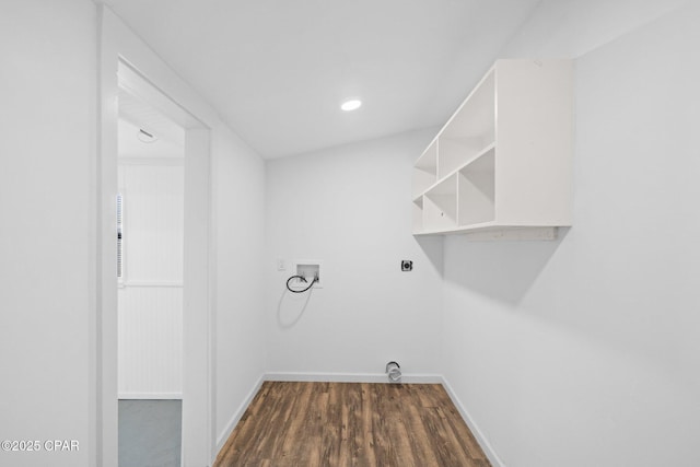 clothes washing area with hookup for a washing machine, dark wood-type flooring, and electric dryer hookup