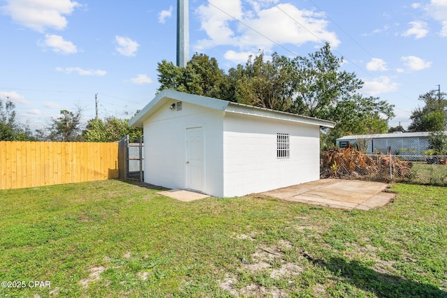 view of outdoor structure featuring a yard