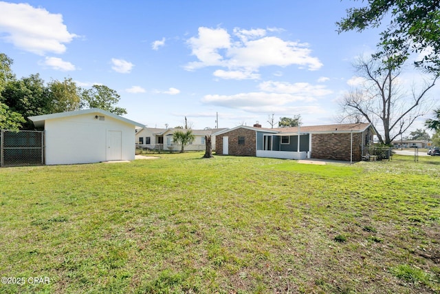 view of yard with a storage unit