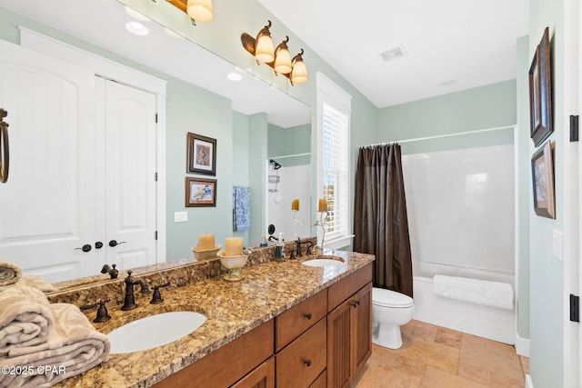 full bath with toilet, shower / bathtub combination with curtain, a sink, and visible vents
