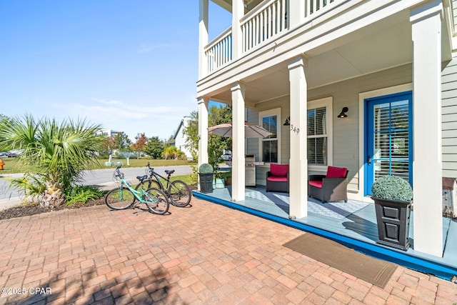 view of patio / terrace featuring a balcony