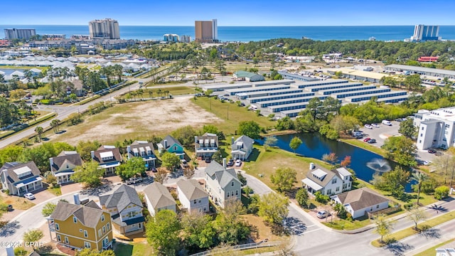 bird's eye view with a city view and a water view