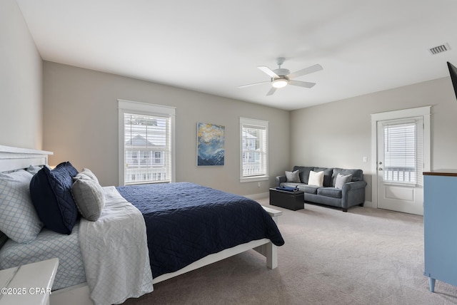 carpeted bedroom featuring ceiling fan