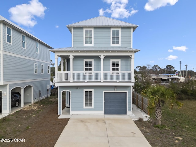 view of front facade featuring a garage, a balcony, and a porch