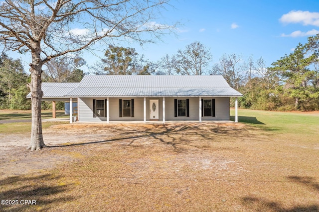 view of front of house with a porch and a front yard