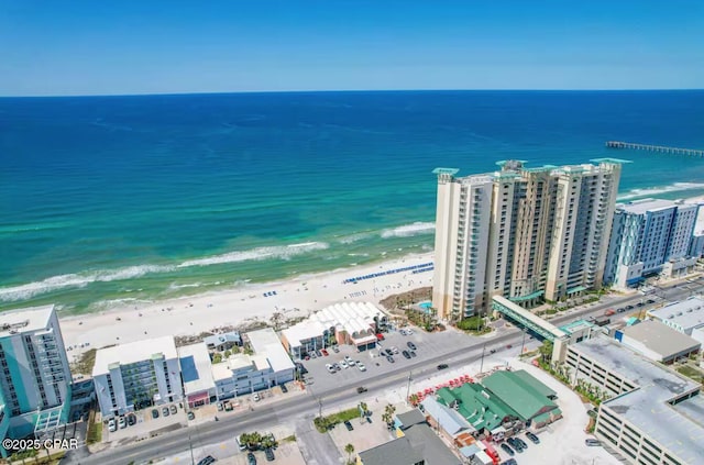 aerial view featuring a view of city, a water view, and a view of the beach