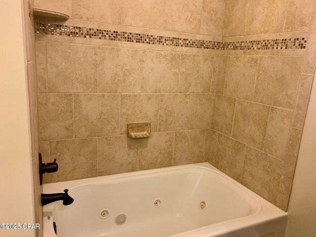 bathroom featuring a bath
