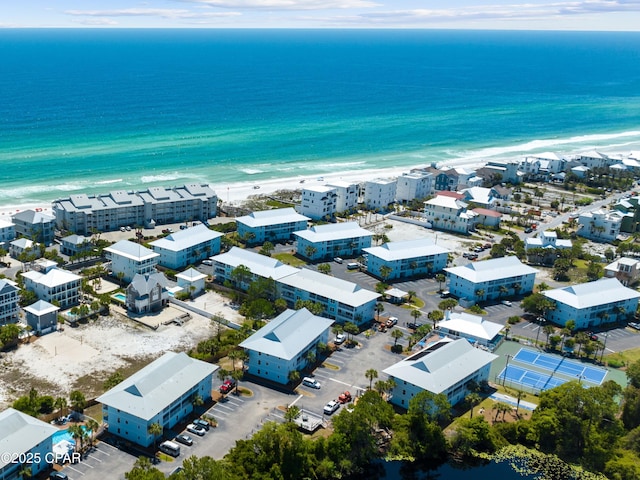 aerial view with a view of the beach and a water view