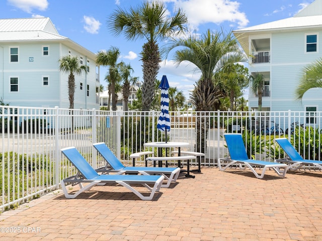 view of patio / terrace with fence