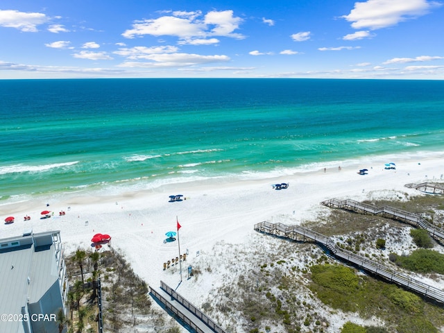 property view of water featuring a beach view