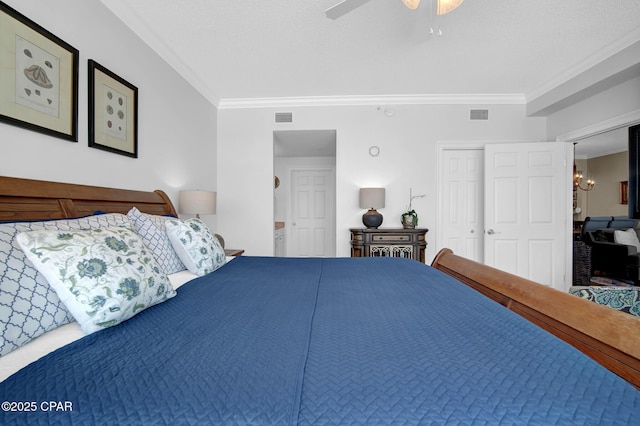 9450 S Thomas Dr Unit 802C, Panama City, FL 32408 - bedroom featuring ornamental molding, a chandelier, a closet, and a ceiling fan