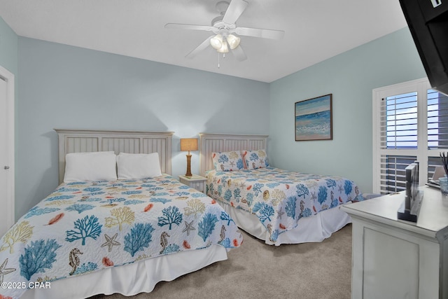 9450 S Thomas Dr Unit 802C, Panama City, FL 32408 - carpeted bedroom featuring ceiling fan