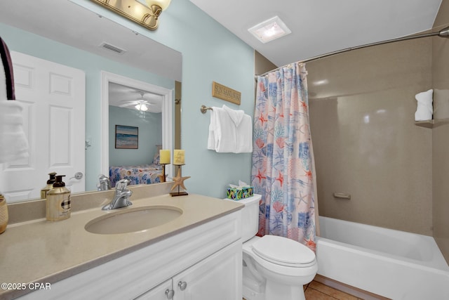 9450 S Thomas Dr Unit 802C, Panama City, FL 32408 - full bathroom featuring vanity, shower / bath combination with curtain, tile patterned floors, and ceiling fan