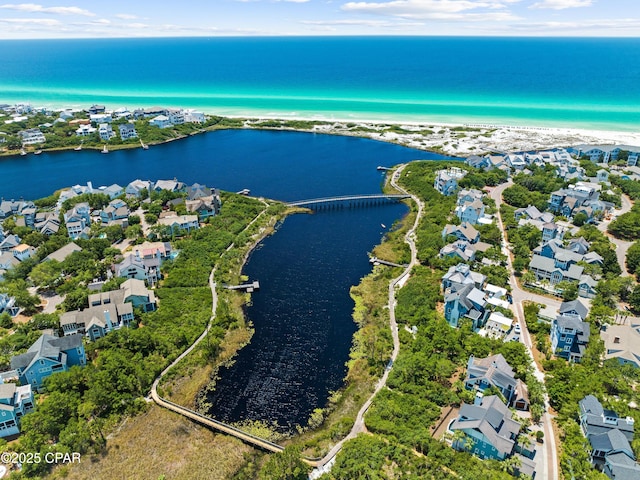 aerial view with a water view and a residential view