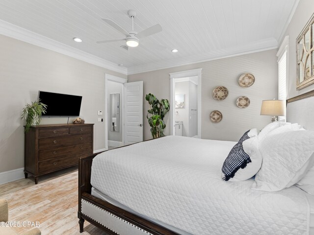 bedroom featuring ornamental molding, ensuite bathroom, recessed lighting, a ceiling fan, and light wood finished floors