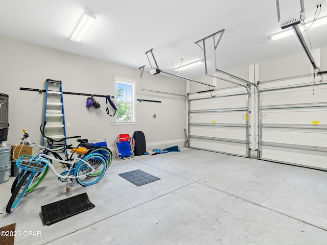 garage featuring a garage door opener