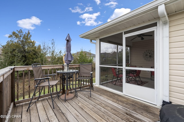 wooden terrace with a sunroom