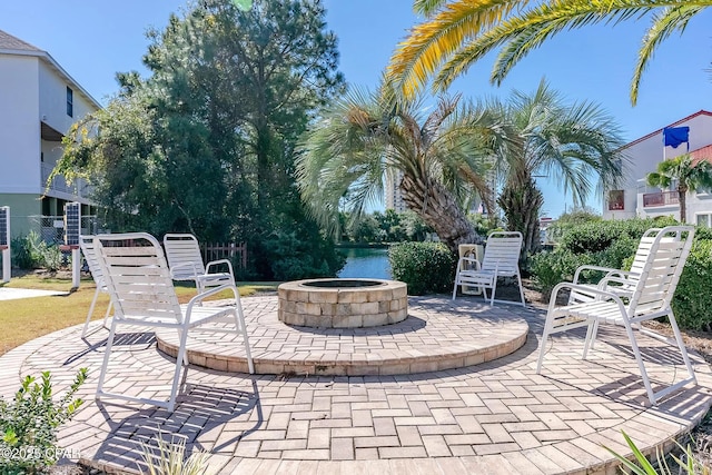 view of patio with an outdoor fire pit