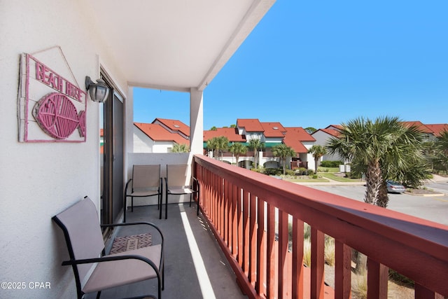 balcony featuring a residential view