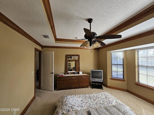 4408 Bylsma Cir, Panama City, FL 32404 - bedroom with light colored carpet, a textured ceiling, baseboards, ceiling fan, and ornamental molding