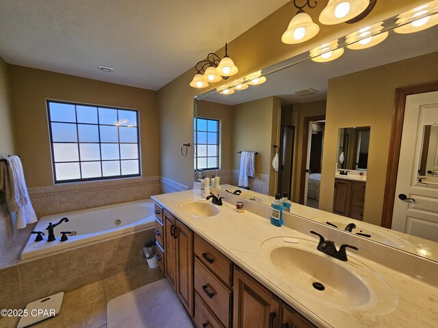 4408 Bylsma Cir, Panama City, FL 32404 - full bath featuring double vanity, a garden tub, and tile patterned flooring