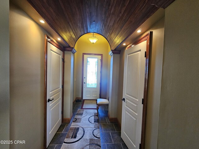 4408 Bylsma Cir, Panama City, FL 32404 - entryway with wood ceiling, baseboards, stone tile flooring, and recessed lighting