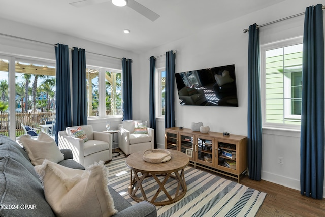 13639 Banana Wind Way, Panama City Beach, FL 32413 - living room with ceiling fan, wood finished floors, and baseboards