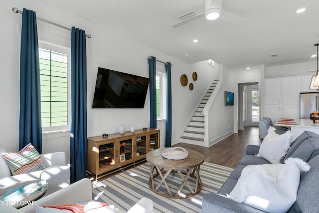 13639 Banana Wind Way, Panama City Beach, FL 32413 - living room with stairway, wood finished floors, recessed lighting, ceiling fan, and baseboards