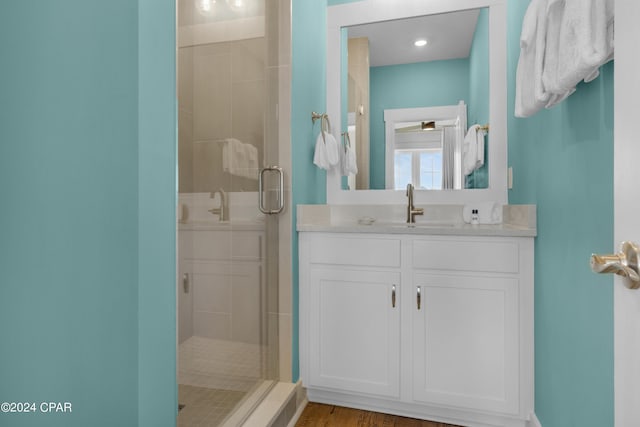 13639 Banana Wind Way, Panama City Beach, FL 32413 - bathroom featuring a shower stall and vanity