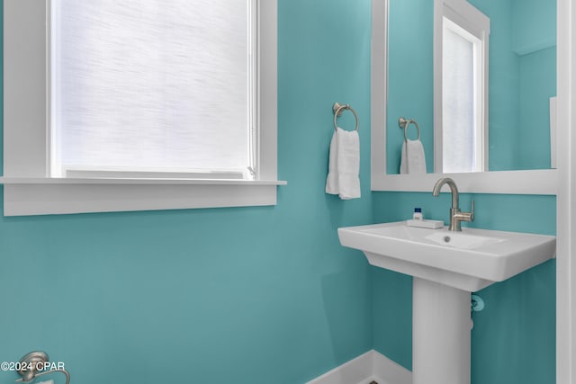 13639 Banana Wind Way, Panama City Beach, FL 32413 - bathroom featuring a sink