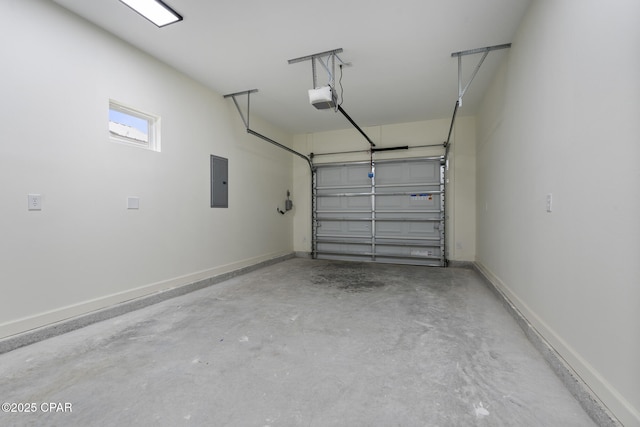 garage with electric panel, baseboards, and a garage door opener