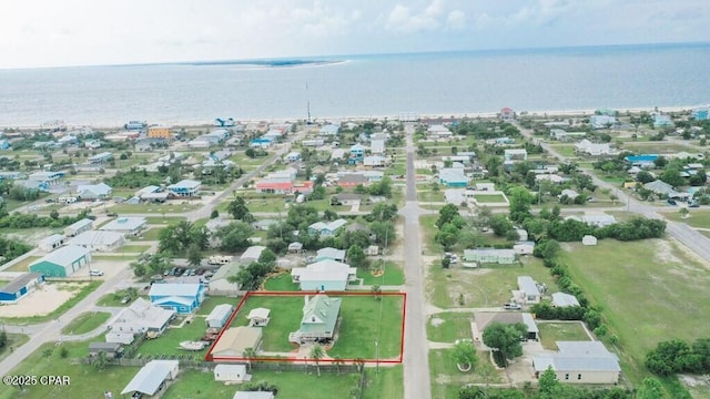 aerial view with a water view and a residential view